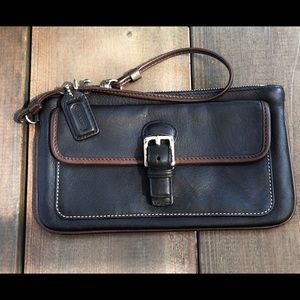 Coach authentic wristlet black with brown trim